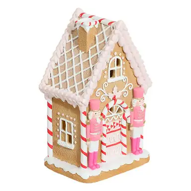 Pink resin house height 25 cm