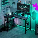 HOMCOM L Shaped Gaming Desk with LED Lights, Power Outlet, USB Charging Ports, 107cm Reversible Corner Computer Desk with Storage Shelves, Monitor Stand for Home Office, Small Space, Black image 1
