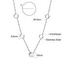 Silver Tone Flower and Mother of Pearl Necklace, 4 Hollow Blossom Charms image 2