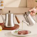 Maxcook 304
Stainless Steel Olive Oil Dispenser & Kitchen Cruet (16.9oz/500mL) - Leakproof Oil Bottle - beech wood Handle image 2