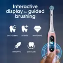 Oral-B iO6 Adult Electric Toothbrush, 1 Toothbrush Head, 5 Modes with Teeth Whitening, UK 2 Pin Plug, Travel Case, Pink Sand image 2