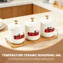 Chinese Style Ceramic Canister Set, White Porcelain Storage Jars with Bamboo Tray for Kitchen Countertop
3-Piece White Ceramic Seasoning Jar Set, Red Accent Design with Spoons for Kitchen Storage image 3