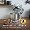 Monsga SM100 Küchenmaschine 1000W, Schwarz/Silber, 6,0L Edelstahl-Rührschüssel, Leise, mit Super-Antihaft Teflon-Knethaken (hitzebeständig bis 260°C), Schneebesen, Flachrührer & Spritzschutz, 8 Geschwindigkeitsstufen image 1