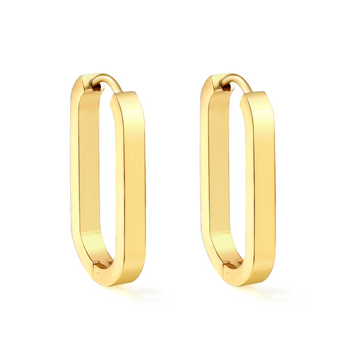 A pair of elongated oval gold hoop earrings on a white background