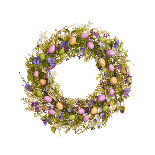 A large spring door wreath with purple flowers and decorative eggs