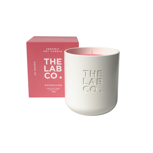 The Lab Co. Energising Luxury Scented Candle in a white ceramic jar