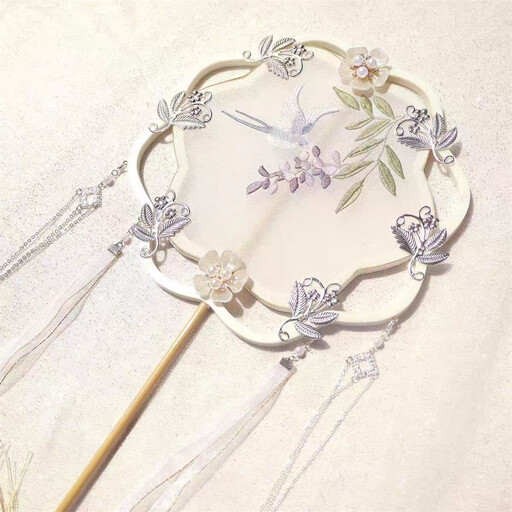 Traditional retro Chinese fan with birds and wisteria