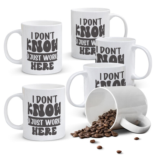 A white mug with the text "I DON'T KNOW I JUST WORK HERE"