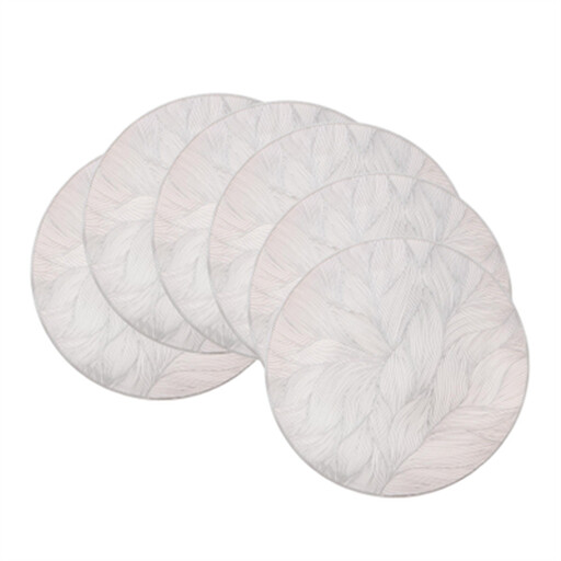 A set of six intricate silver-coloured round PVC placemats with a floral-like pattern.