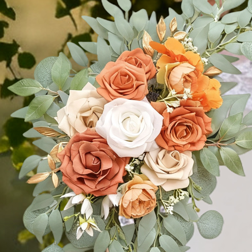 Set of two terracotta-coloured artificial floral arrangements for a wedding welcome sign