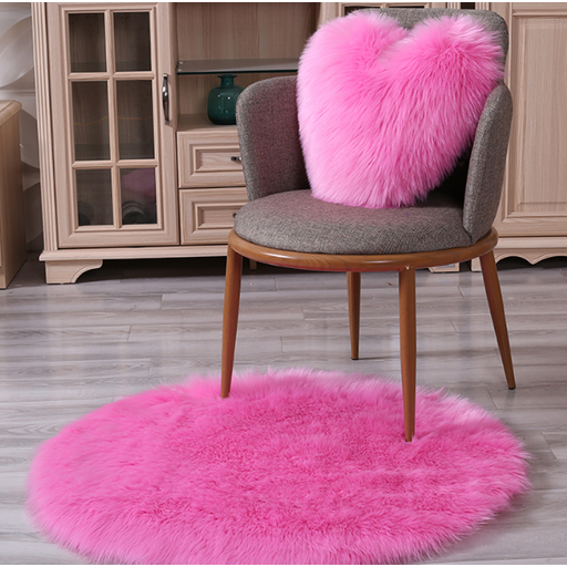 Flauschiger runder Kunstwoll-Teppich in Rosa