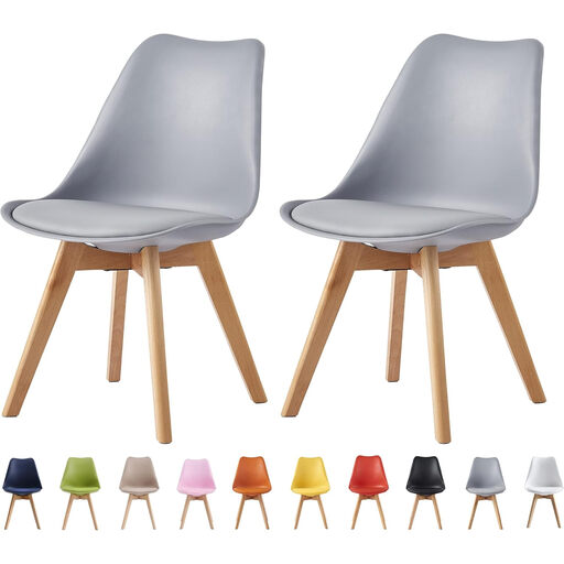 A set of two grey Scandinavian-style dining chairs with wooden legs and padded seats.