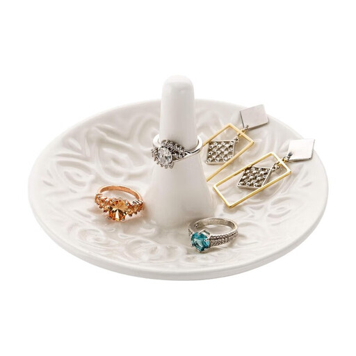 White ceramic jewelry dish with ring cone and heart design