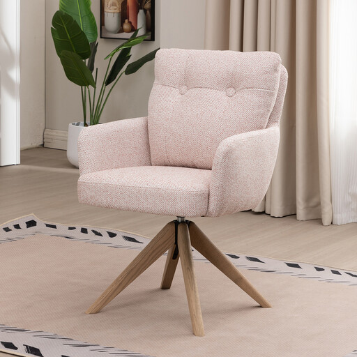A blush pink fabric dining chair with a button-tufted back, a bucket seat design and a four-legged wooden swivel base.