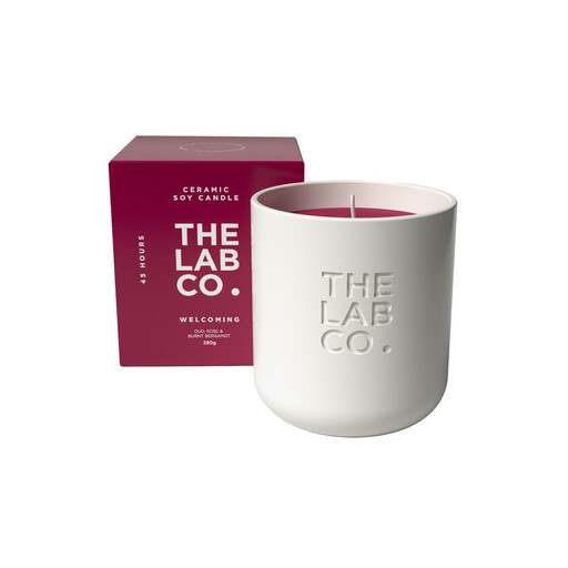 The Lab Co. Welcoming Luxury Scented Candle in a beige ceramic jar