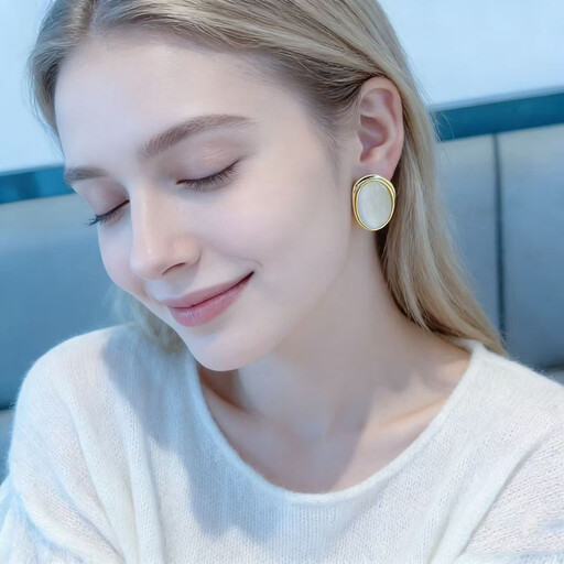 VoxorAI geometric stud earrings with white cat's eye stone