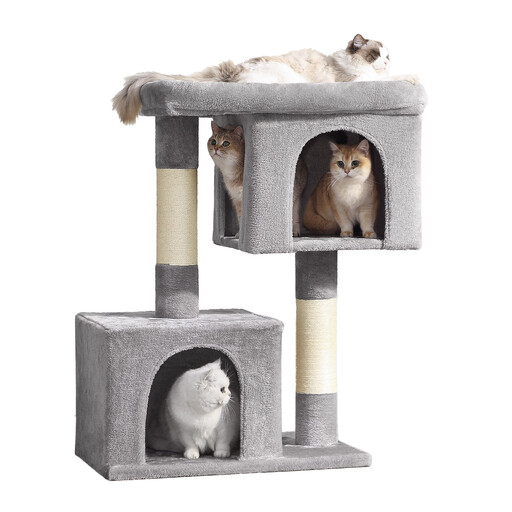 A large, light grey cat tree with multiple levels, two hideouts, and scratching posts.