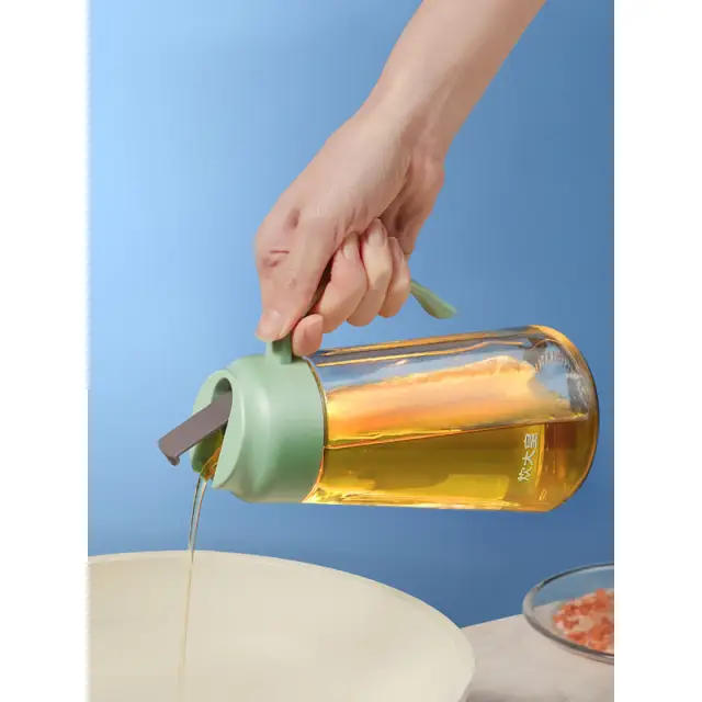 COOKER KING Oil Dispenser Drip Free Spout for Kitchen Glass Oil and Vinegar Dispenser Olive Oil Bottle
Soy Sauce Dispenser Oil Container 650ML